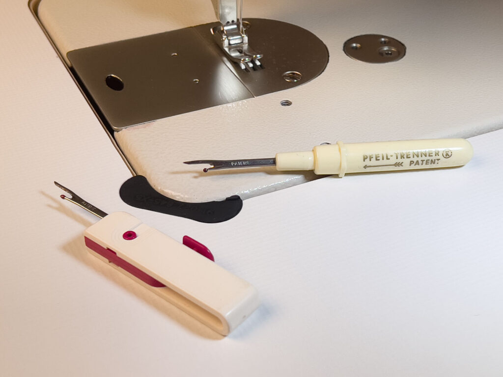 Schneiderwerkzeug: Pfeiltrenner